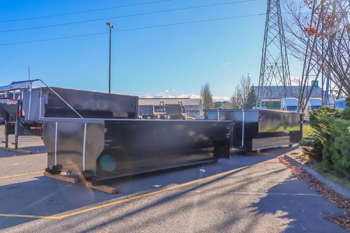 Roll-off dumpster ready for waste disposal at job site for Concrete Dumpster Rental in Fort Thomas